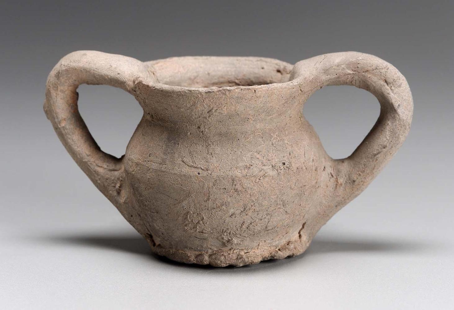 Miniature cup with high handles (kantharos)