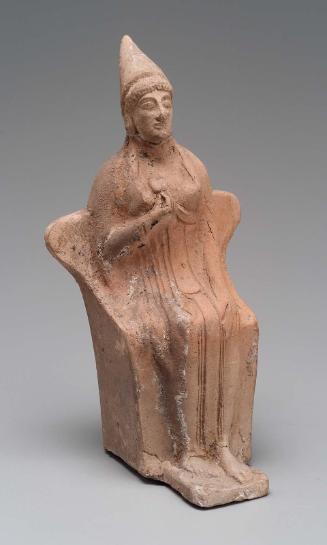 Figurine of Aphrodite holding a flower