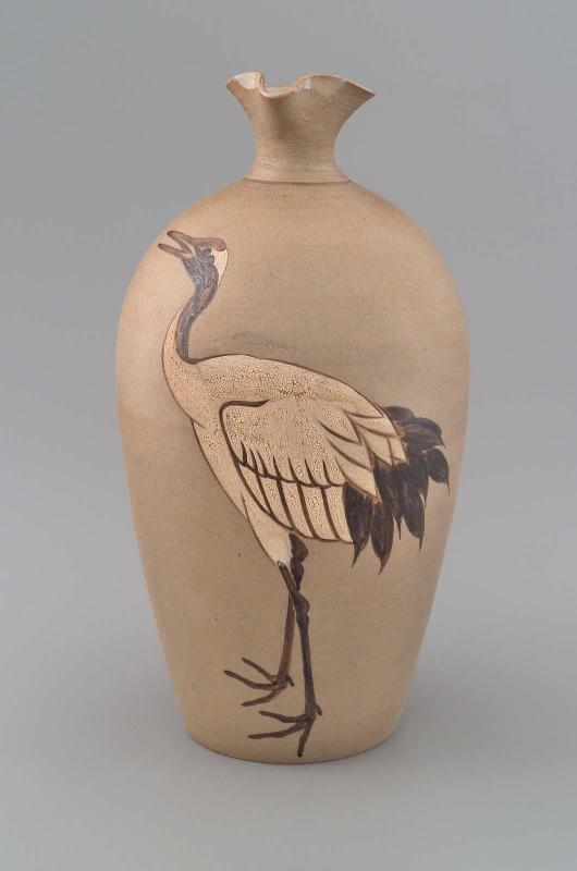 Sake bottle with flaring mouth and design of crane