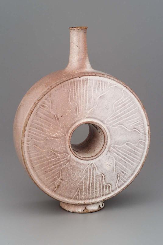 Sake bottle in a circular design