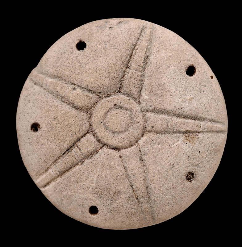 Pierced star rosette disc