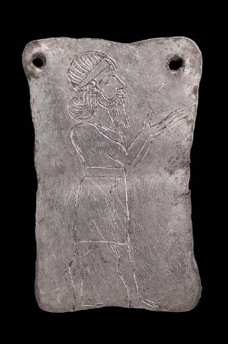 Votive plaque with man praying