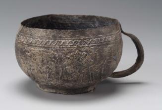 Decorated bronze cup