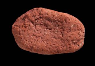 Fragment of red paste or pigment