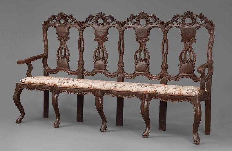 Four chair-back settee