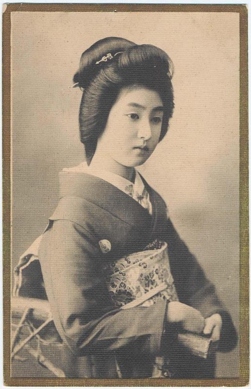 Young Woman in Flowered Obi
