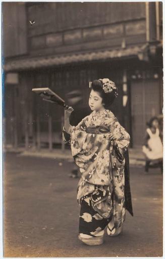 Girl Playing Battledore and Shuttlecock