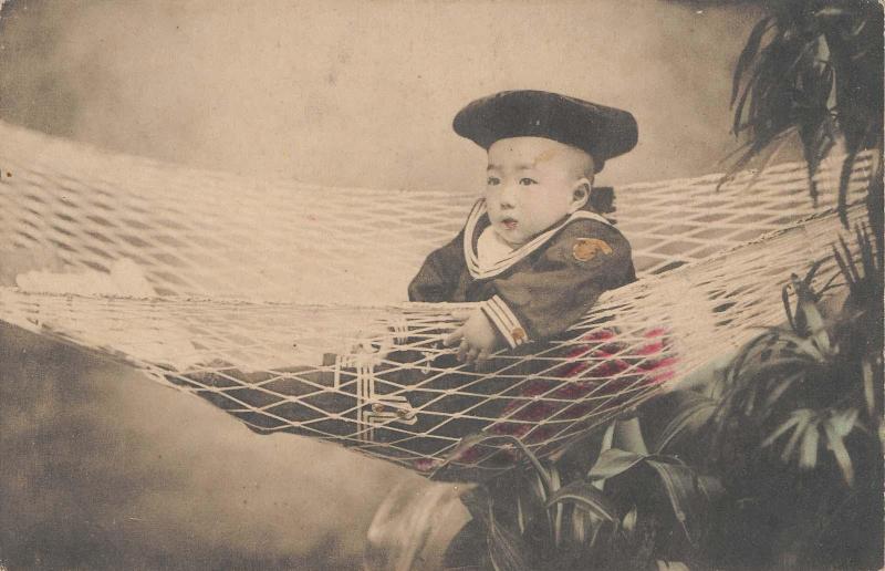 Boy in Sailor Clothes on Hammock