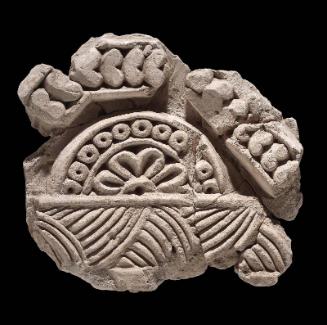 Stucco plaque of a decorative floral relief