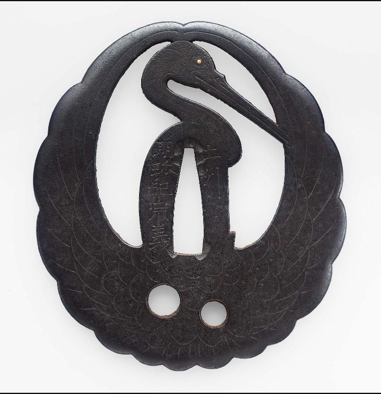 Tsuba in the form of a stylized crane