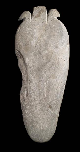 Shield-shaped palette with double bird head motif