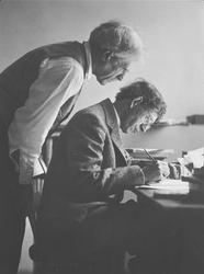 Alfred Stieglitz looking over John Marin's Shoulder