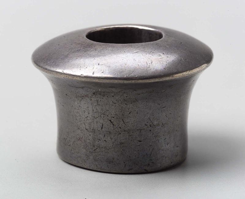 Mace head (?) or thumb ring (?)