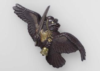 Kanamono in the form of a crow-tengu with sword and ritual bell
