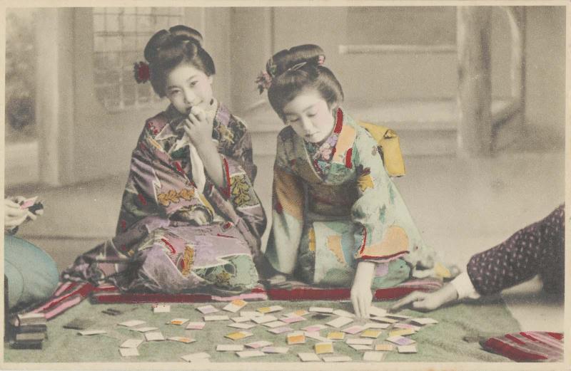 Little Girls Playing Cards