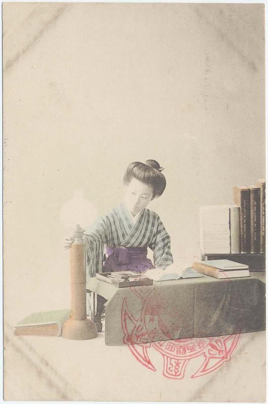 Woman Reading by a Lamp
