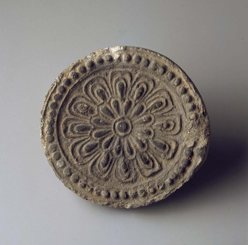 Roof-end tile with lotus pattern