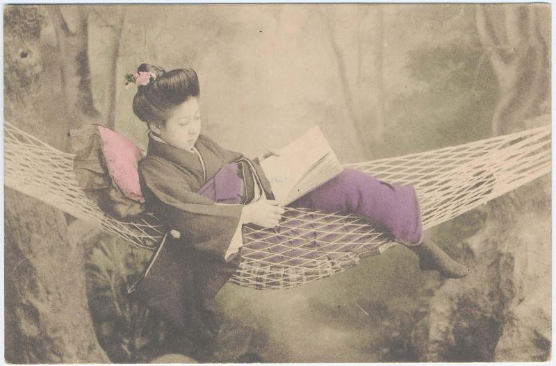 Woman in a Hammock Reading a Book