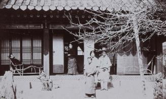 Foreign teacher with his Japanese wife and Eurasian children with servants in their home, formally a temple (NRICP Relic No.: 2868)