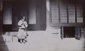 Boy blowing soap bubbles (NRICP Relic No.: 2885)