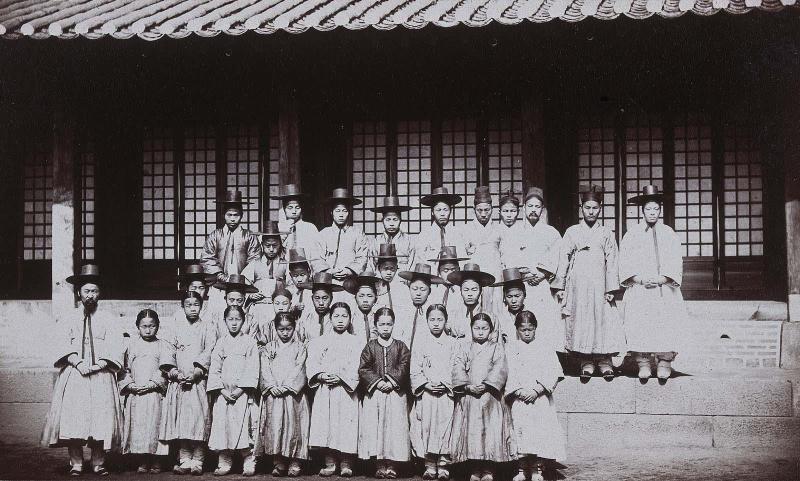 The foreign school, English, arithmetic, etc. Begun in August 83'. Members with hats are married, those without are unmarried: Taken in Front of School house (NRICP Relic No.: 2867)
