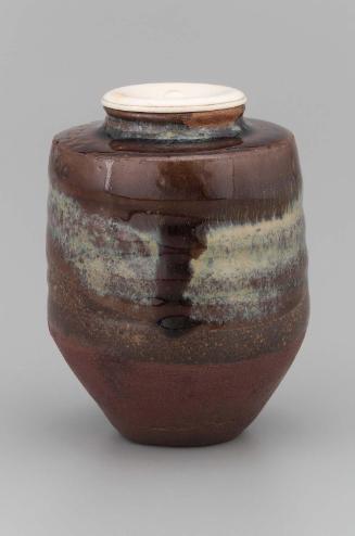 Lid to tea jar