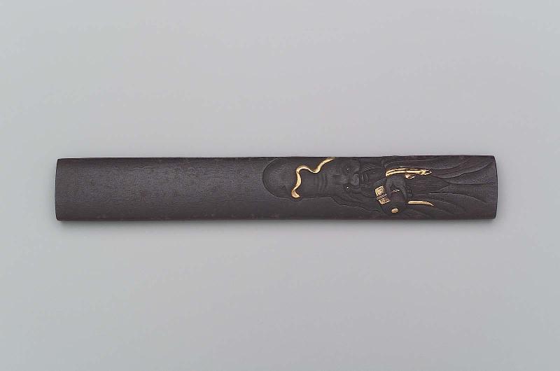 Kozuka with design of Fukurokuju holding a scroll