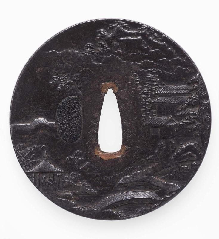 Tsuba with design of landscape with buildings and figures
