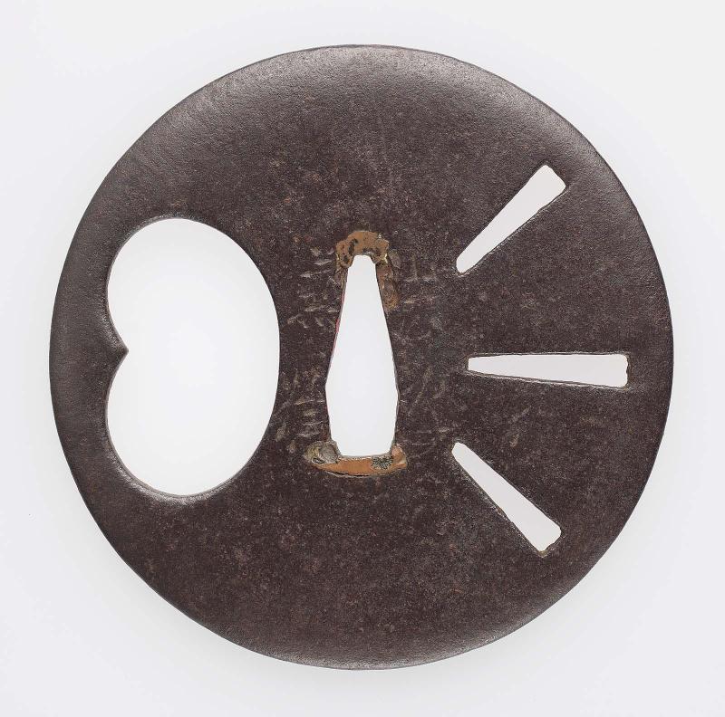 Tsuba with design of suhama and cartwheel