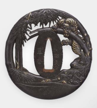 Tsuba modeled as a tiger and bamboo