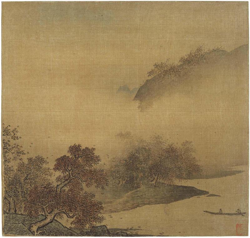Autumn foliage along a river