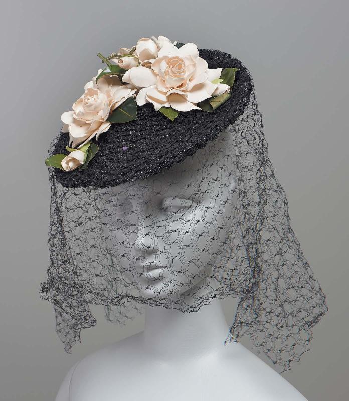 A small black straw hat
