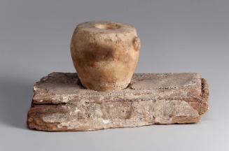 Base for a model offering vessel