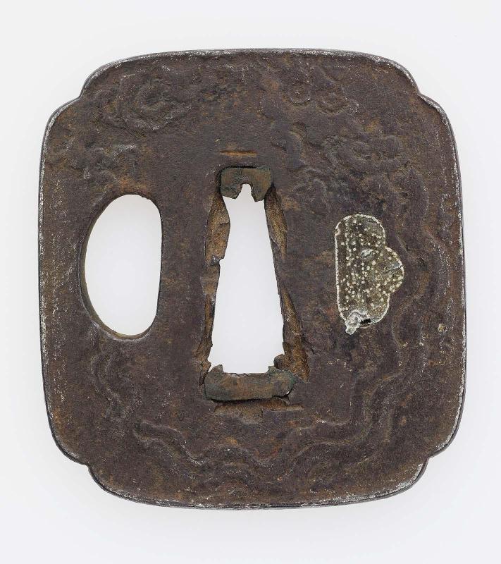 Tsuba with design of stylized dragons and clouds