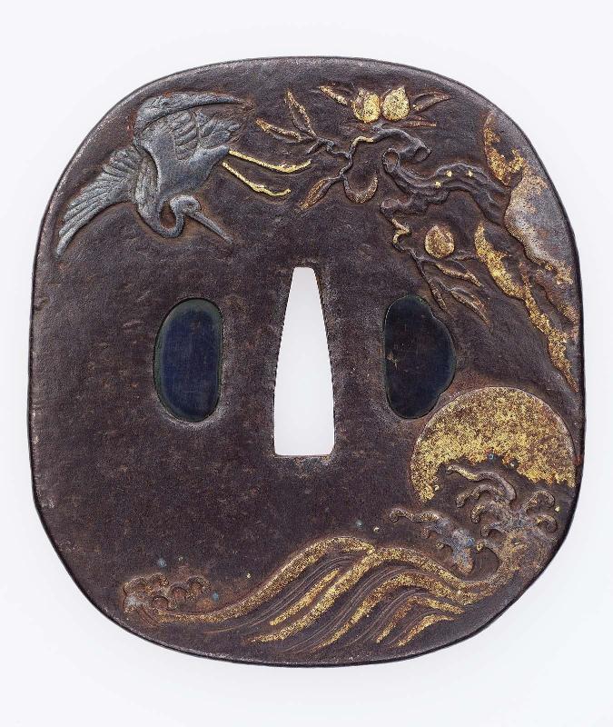 Tsuba with design of crane, peaches, sun and waves