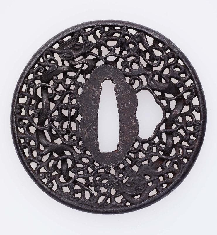 Tsuba with design of dragons and foliage