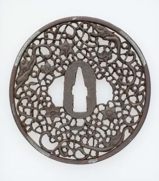 Tsuba with design of dragons  and foliage