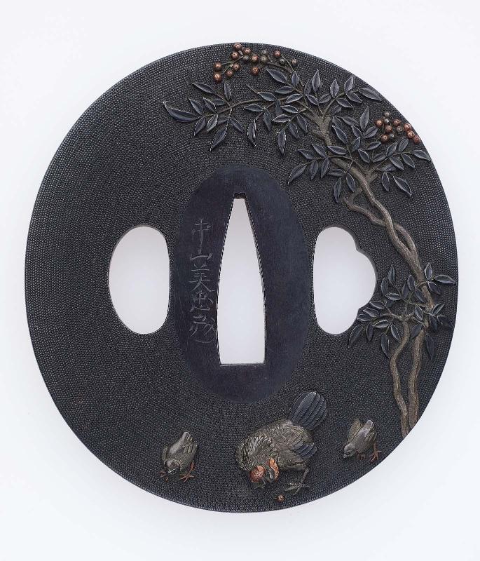 Tsuba with design of hen and chicks beneath a flowering shrub