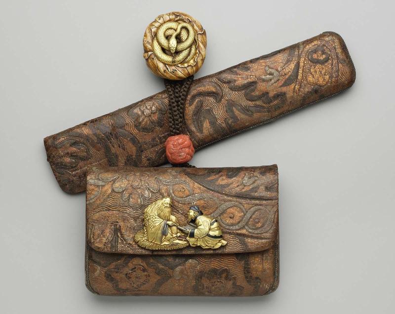 Tobacco-pouch and pipecase with embossed designs; netsuke; kanamono; ojime