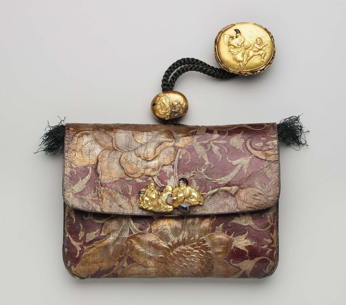 Tobacco-pouch and pipecase with embossed designs;  netsuke; kanamono; ojime