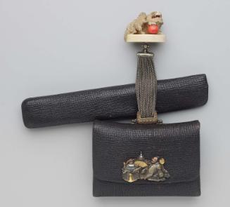 Tobacco-pouch and pipecase; netsuke in the form of a shishi and young with a coral ball on a base, kanamono in the form of two Manzai dancers enjoying a New Year banquet; rectangular gold filigree ojime; silver chains