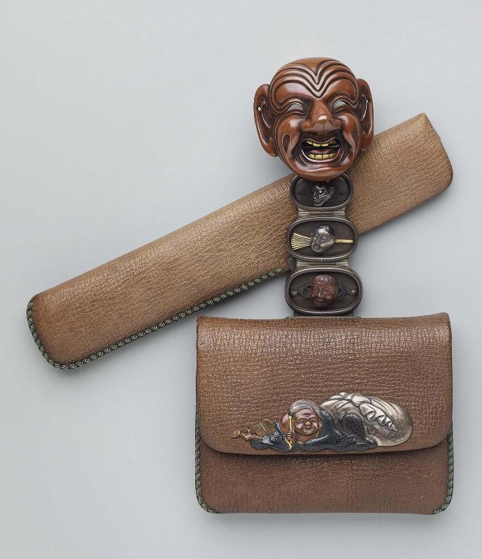 Tobacco-pouch; netsuke; kanamono; inner plate with Chinese child reading a book and another figure with Chinese hat and fan; leather pipe-case