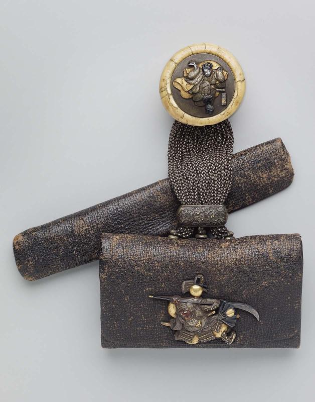 Tobacco-pouch; kagami netsuke with design of Ushiwakamaru; silver chain with fitting with design of pine, bamboo and plum; kanamono in the form of Benkei; inner plate with design of the Gojo bridge; leather pipe-case