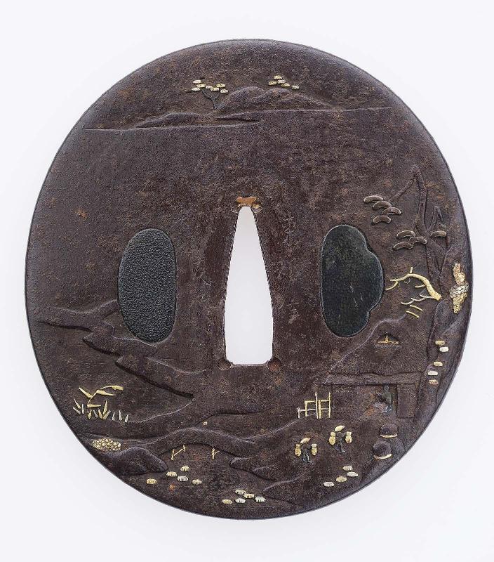 Tsuba with design of landscape with rustic dwelling, bridge and lake