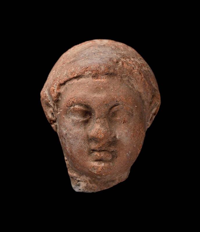 Head of a male statuette