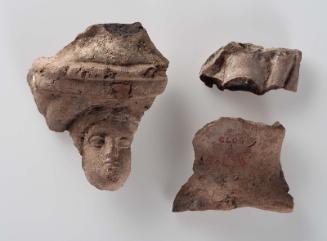 Three fragments of a female figure
