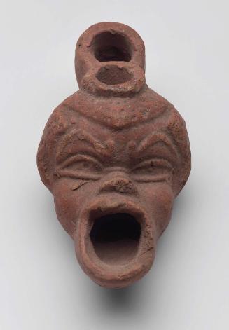 Grotesque face lamp