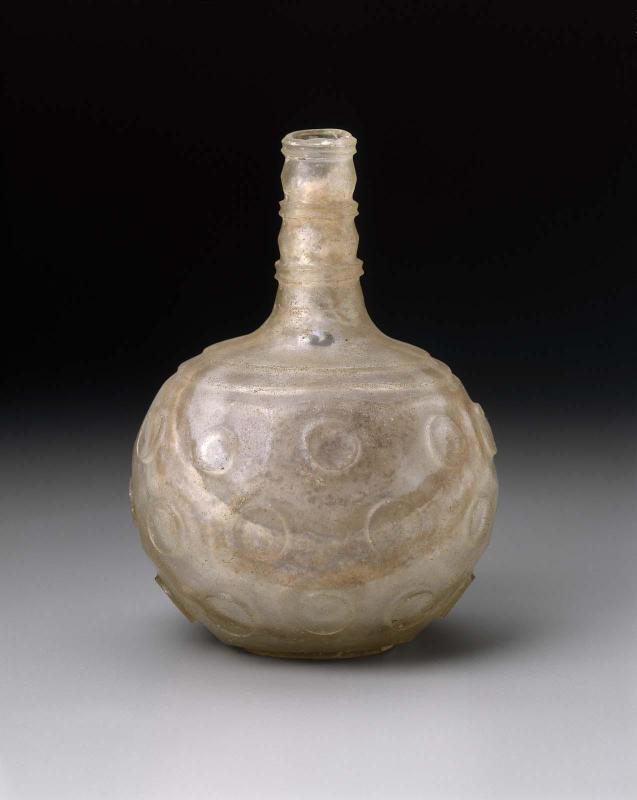 Bottle with cylindrical bosses