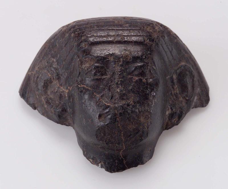Head of a male statuette