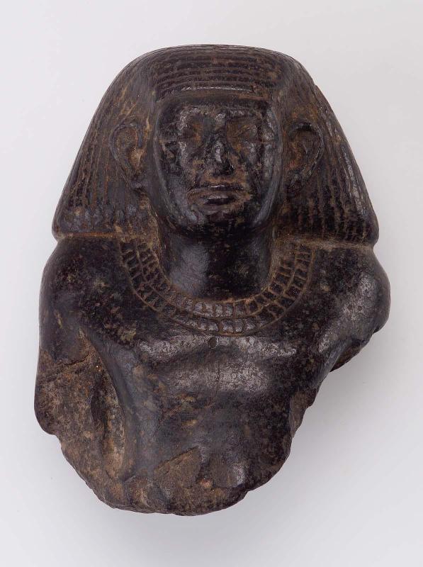 Fragment of a male statuette